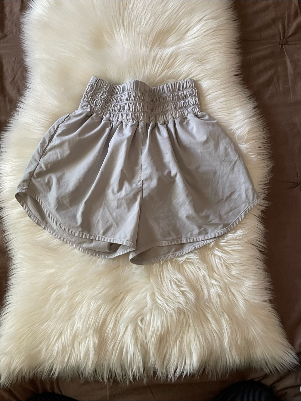 Nike Women's Light Gray Athletic Smocked-Waist Shorts